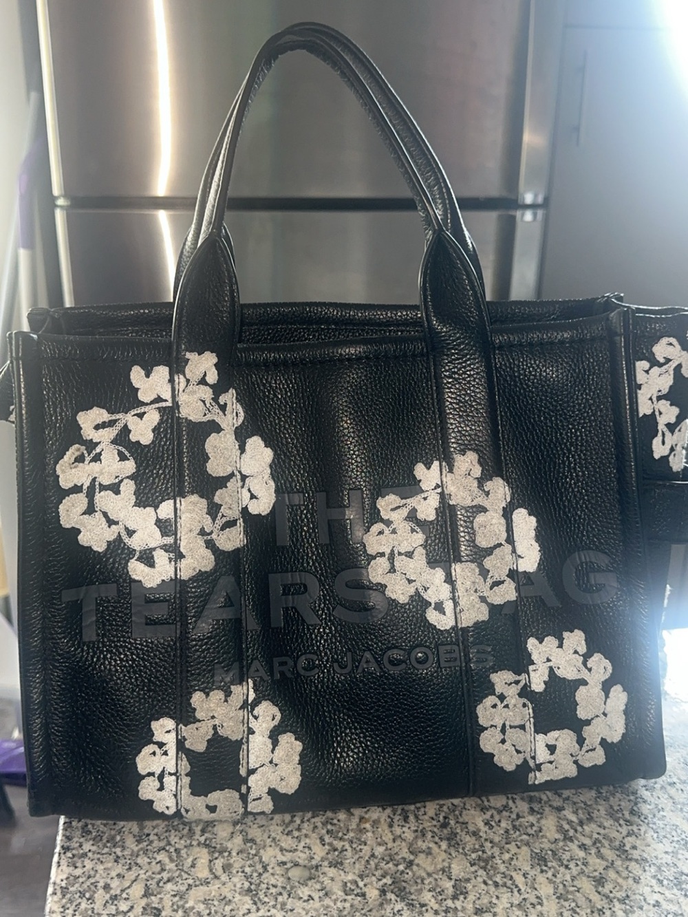 Marc Jacobs Black Leather Tote with White Floral Wreath Accents
